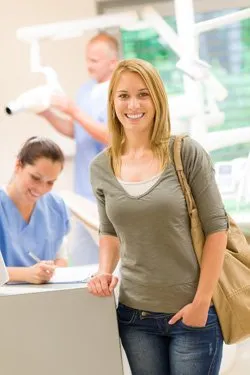 smiling woman at dental office