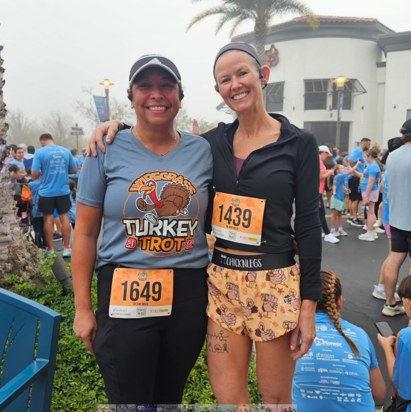 Two women posing on fun run event