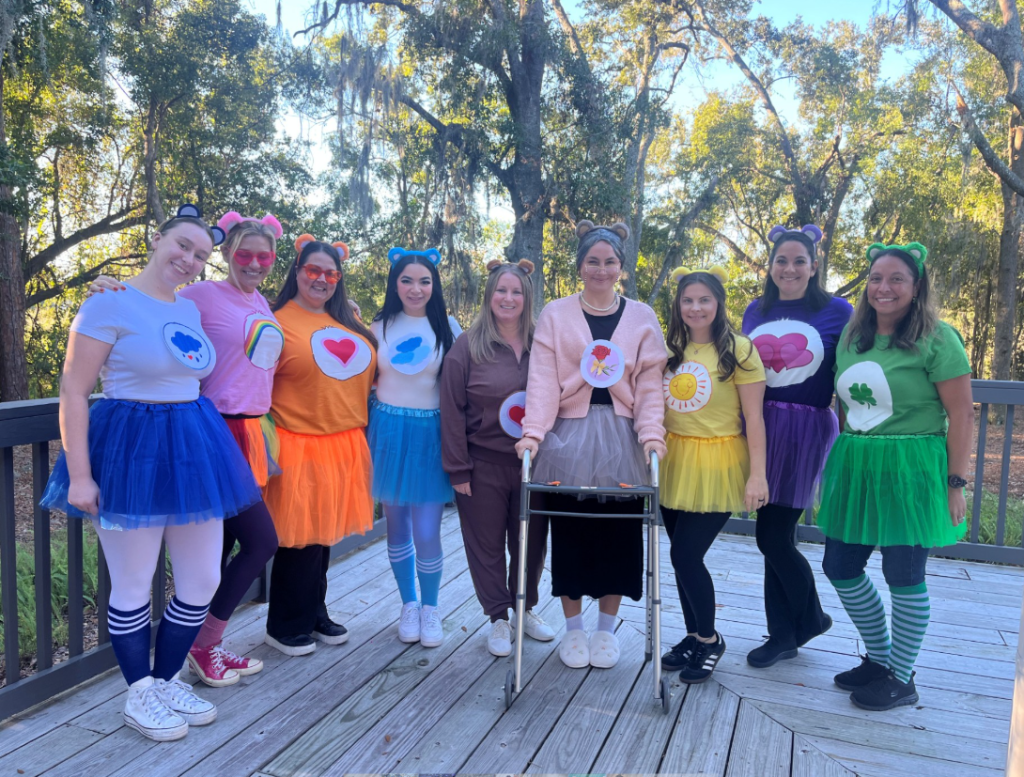 The staff wearing a carebear t-shirt and tutu skirt