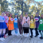 The staff wearing a carebear t-shirt and tutu skirt