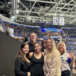Staff members in a hockey game